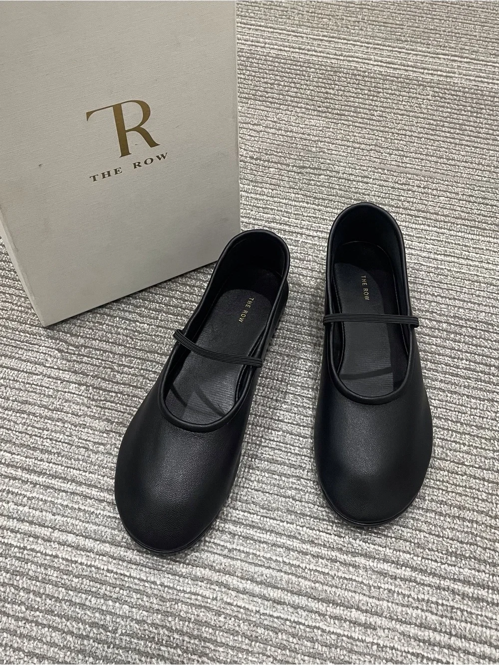 The Row Black Leather Mary Jane Flats